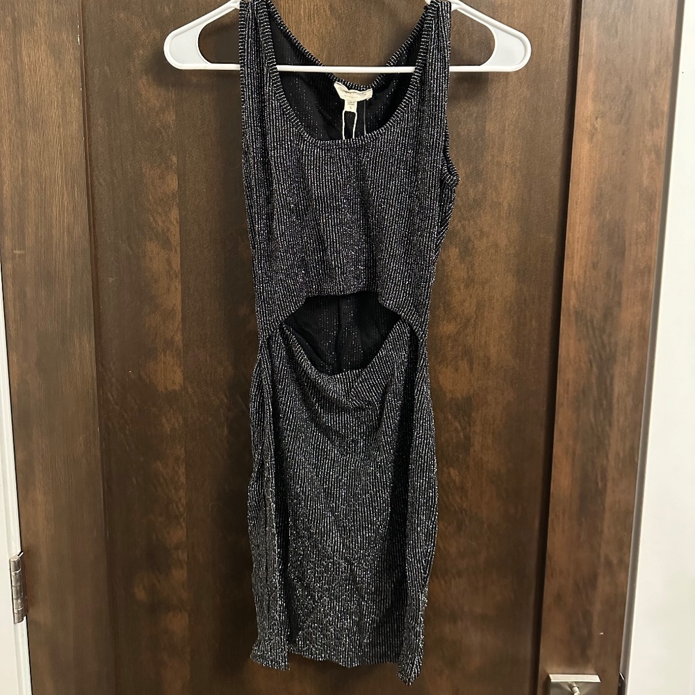 Black shiny mini dress with front cutout
